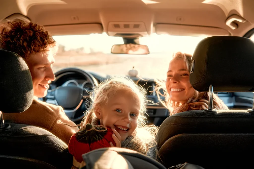 Family driving together in their car